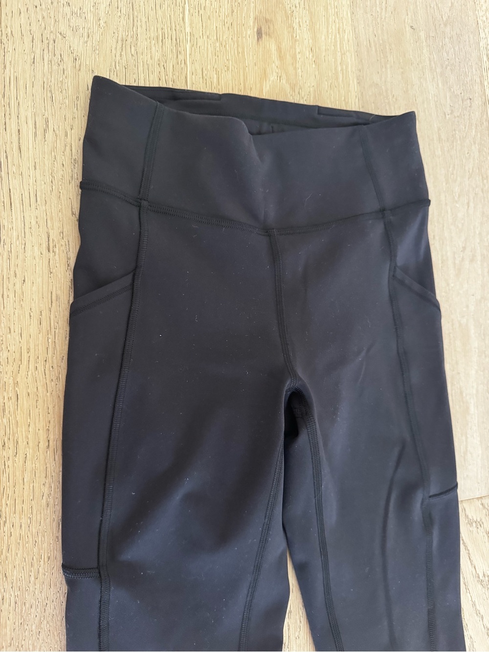 Lululemon Invigorate high rise black pocket leggings, women’s size 4